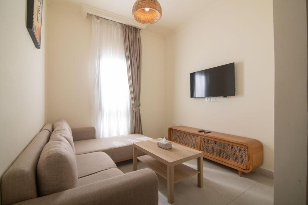 TV a/nebo společenská místnost v ubytování Ios Hotel & Village