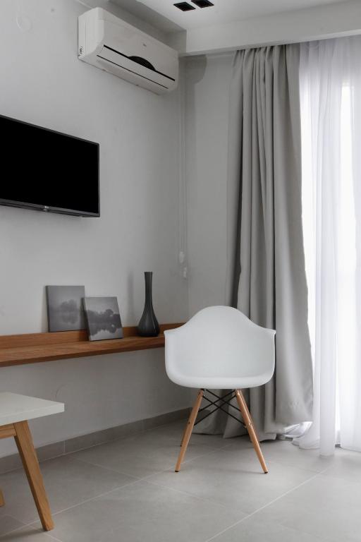 TV a/nebo společenská místnost v ubytování Muses Studios