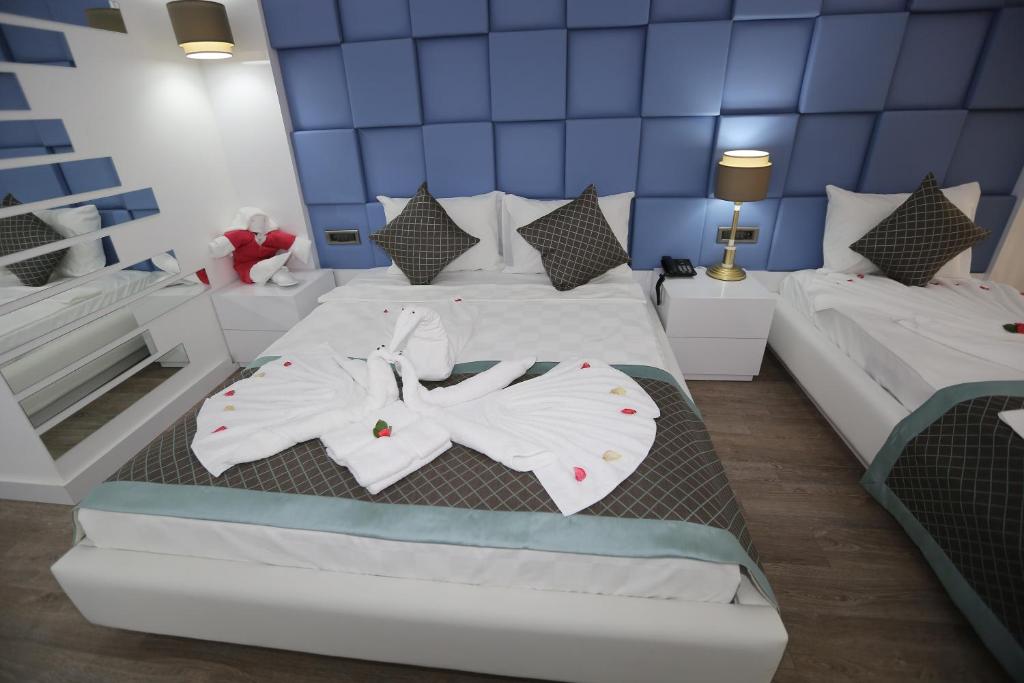 Postel nebo postele na pokoji v ubytování Elips Royal Hotel & SPA