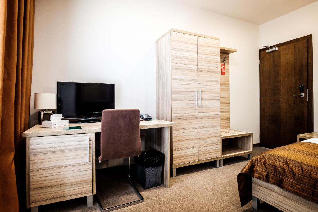 TV a/nebo společenská místnost v ubytování Hotel Deluxe with free Wellness and Fitness Centrum