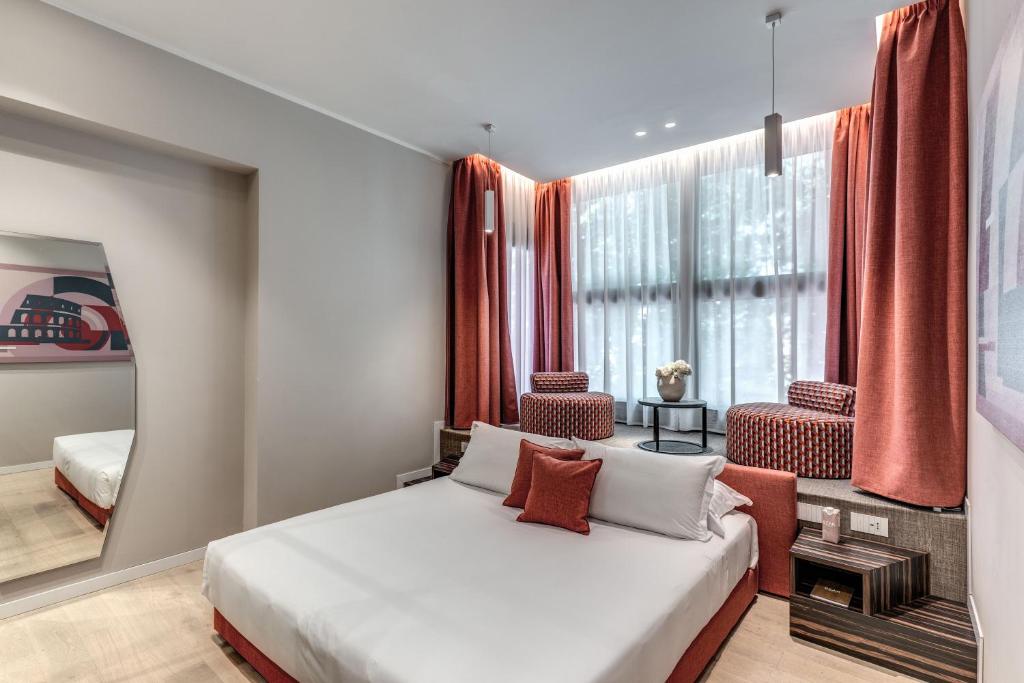 Postel nebo postele na pokoji v ubytování Parioli Cube Hotel