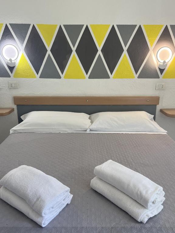 Postel nebo postele na pokoji v ubytování Hotel Splendor