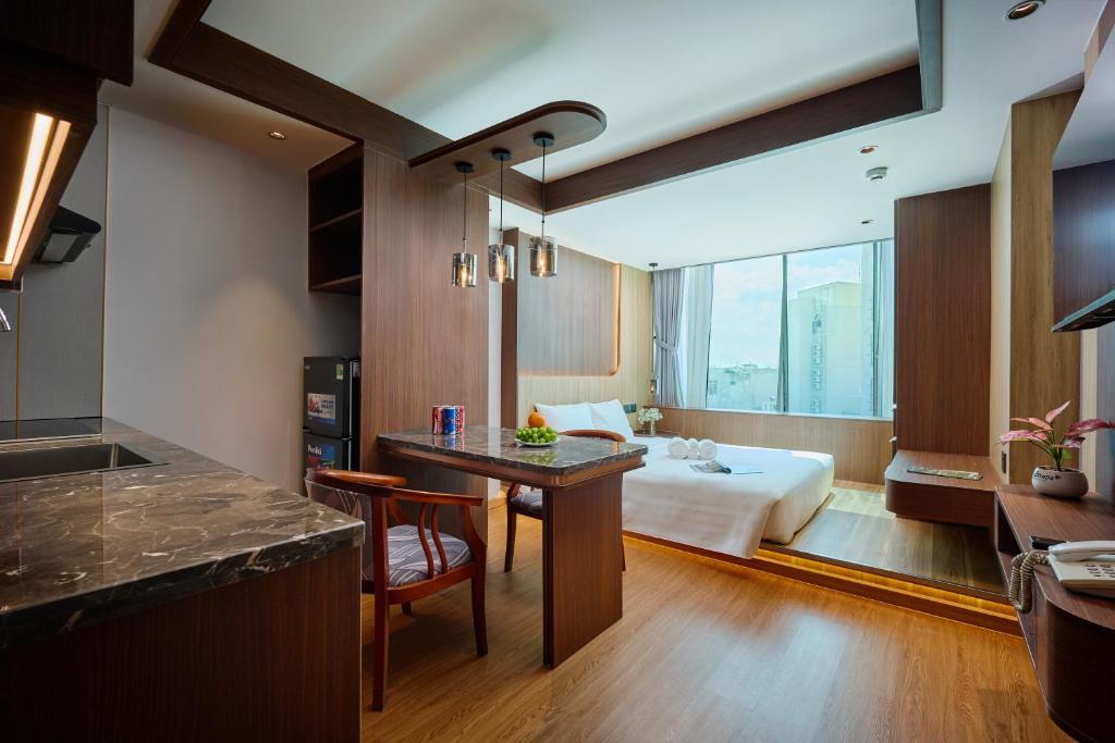 Postel nebo postele na pokoji v ubytování Elite Luxury Hotel