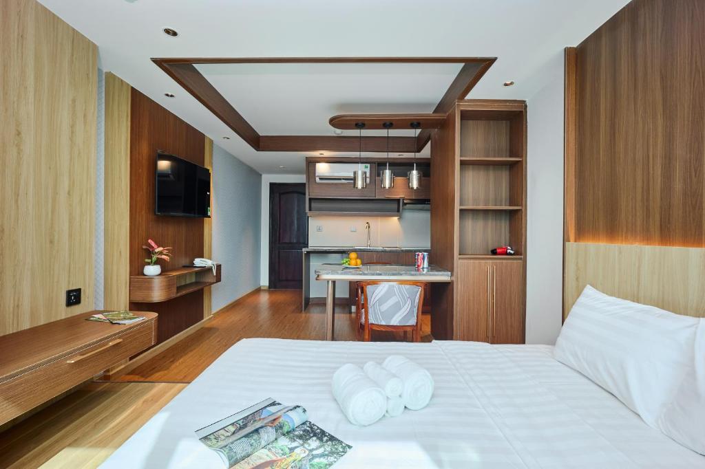 Postel nebo postele na pokoji v ubytování Elite Luxury Hotel