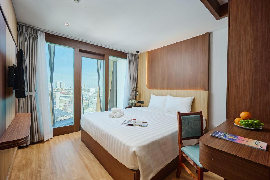 Postel nebo postele na pokoji v ubytování Elite Luxury Hotel