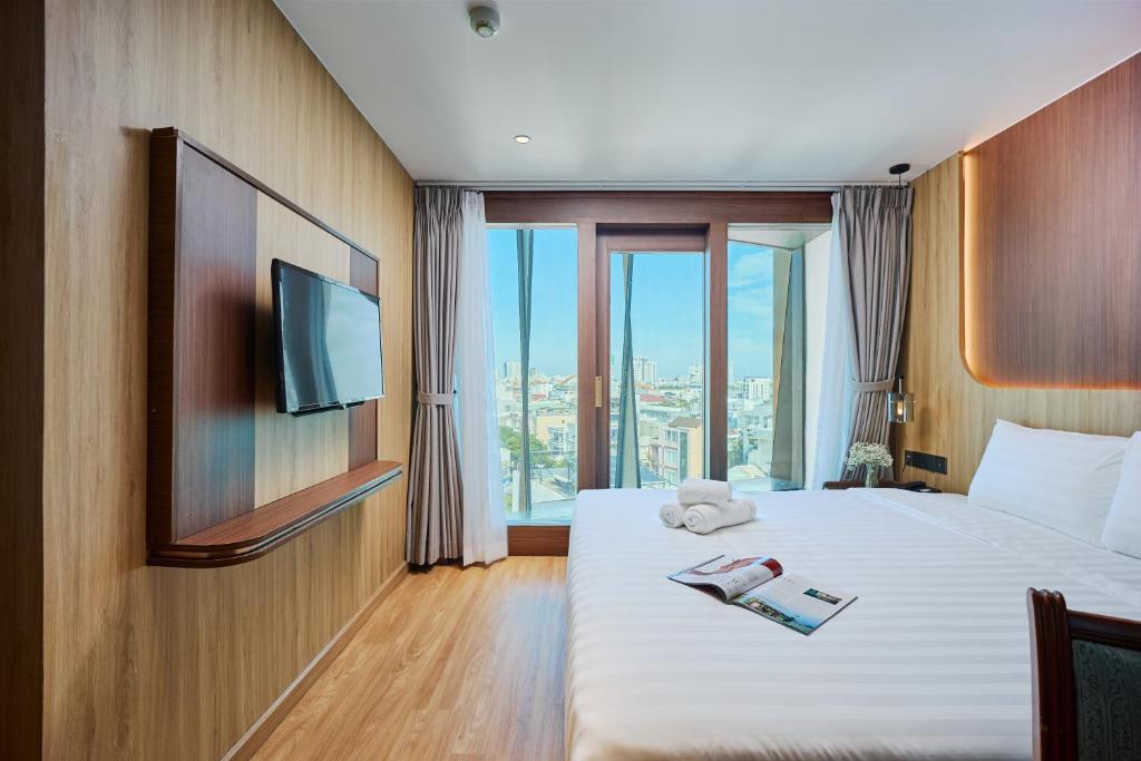 Postel nebo postele na pokoji v ubytování Elite Luxury Hotel