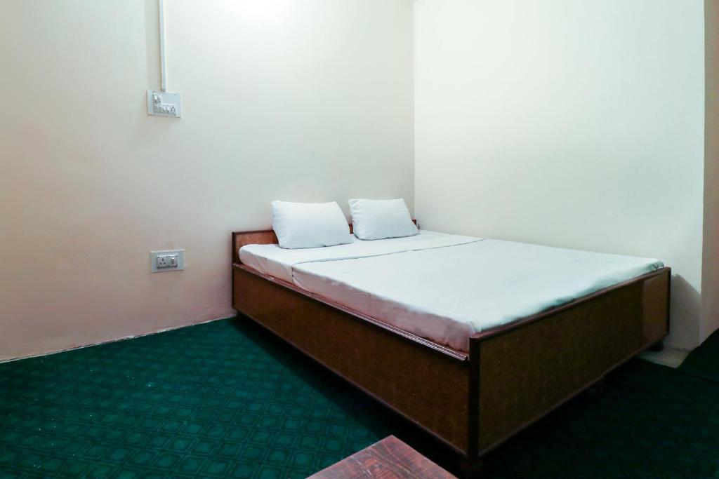 Postel nebo postele na pokoji v ubytování hotel dp bar and restaurent