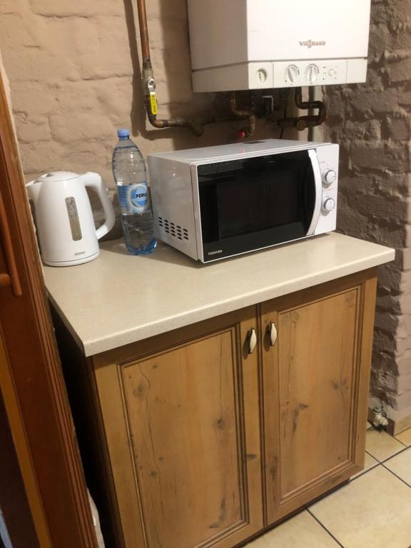Kuchnia lub aneks kuchenny w obiekcie Apartament przy Rynku 2