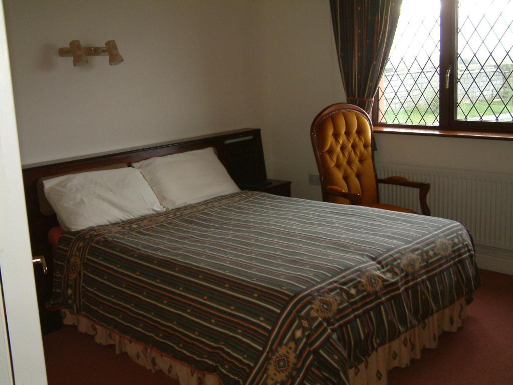 Postel nebo postele na pokoji v ubytování Seanor House Bed & Breakfast
