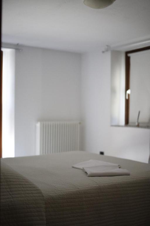 Postel nebo postele na pokoji v ubytování La Maison Jaune