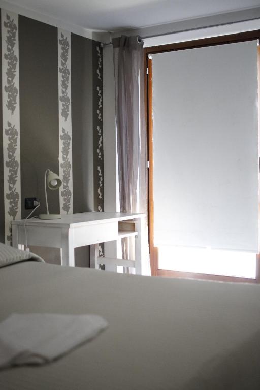 Postel nebo postele na pokoji v ubytování La Maison Jaune