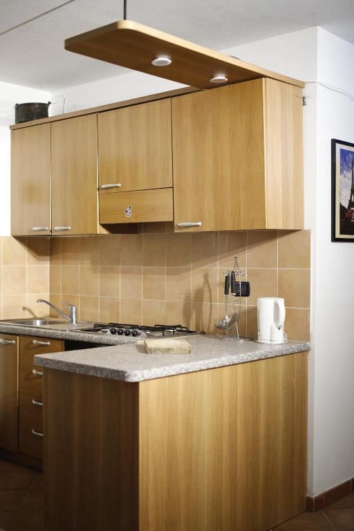 Kuchyň nebo kuchyňský kout v ubytování La Maison Jaune