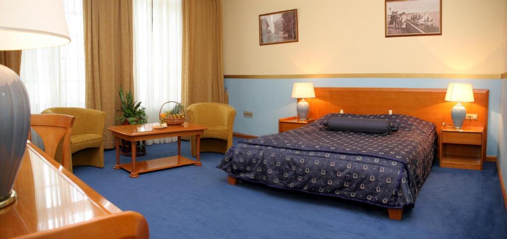Krevet ili kreveti u jedinici u okviru objekta Garni Hotel Park