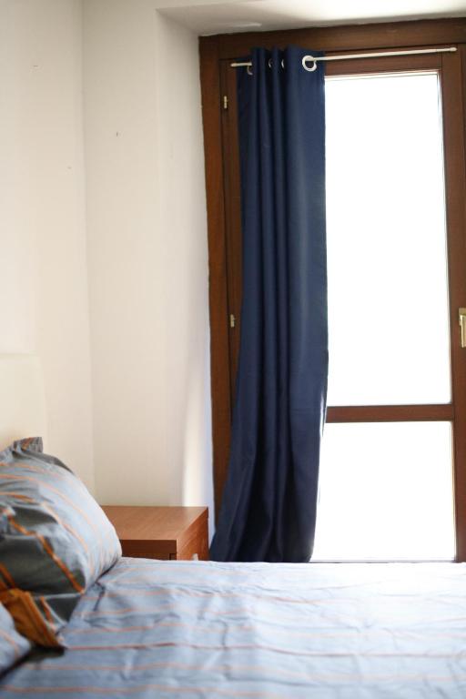 Postel nebo postele na pokoji v ubytování La Maison Jaune