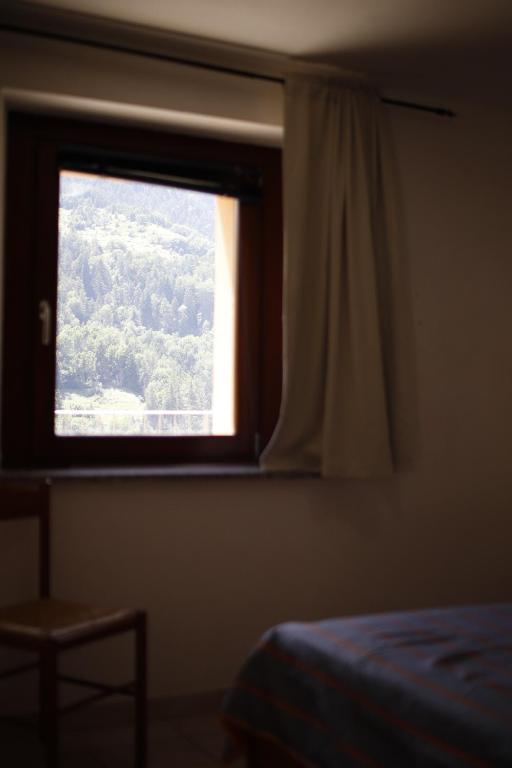 Postel nebo postele na pokoji v ubytování La Maison Jaune