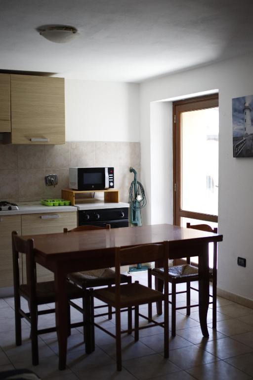 Kuchyň nebo kuchyňský kout v ubytování La Maison Jaune