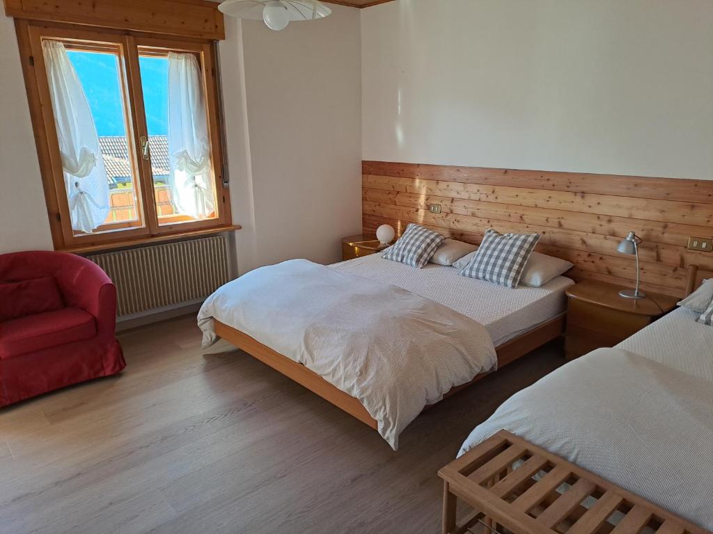 Postel nebo postele na pokoji v ubytování Appartamento Maurizio
