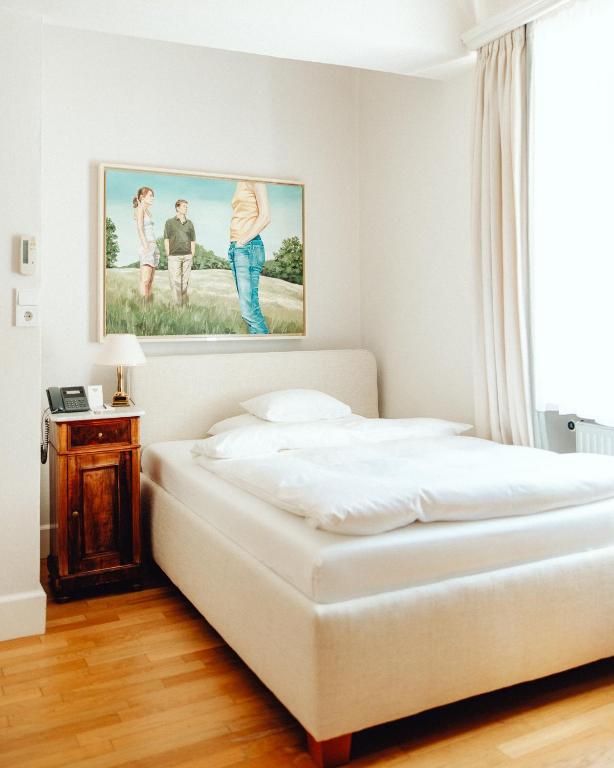 Katil atau katil-katil dalam bilik di Schlossberghotel