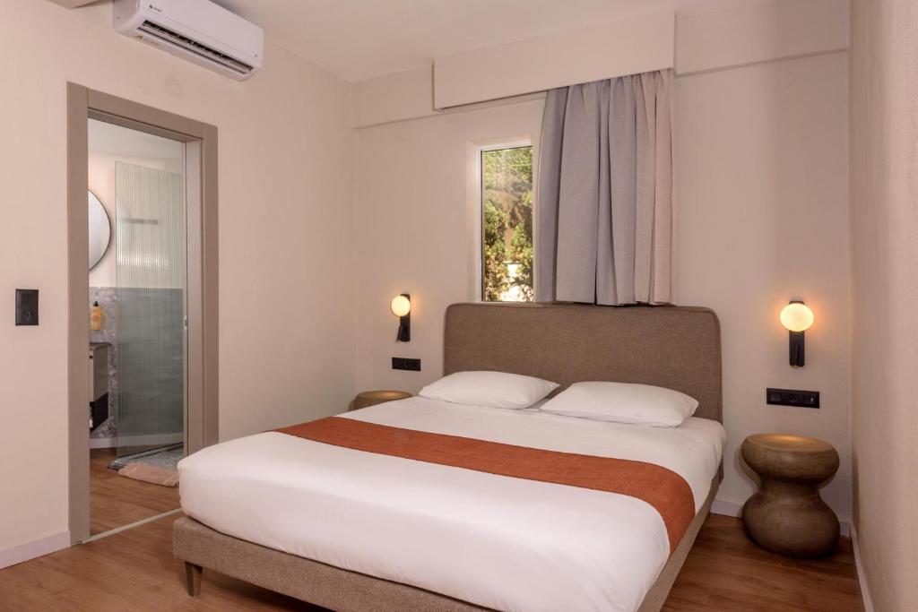 Postel nebo postele na pokoji v ubytování Zeus Hotels Ydoria Resort