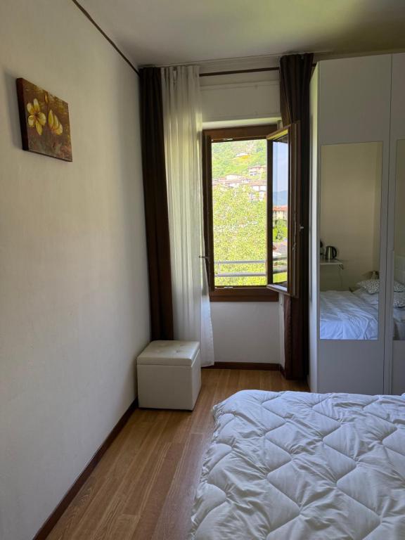 Postel nebo postele na pokoji v ubytování Albergo al lago