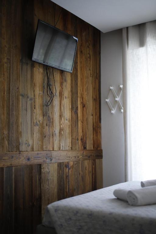 Postel nebo postele na pokoji v ubytování SMILE ACCOMODATION AOSTA