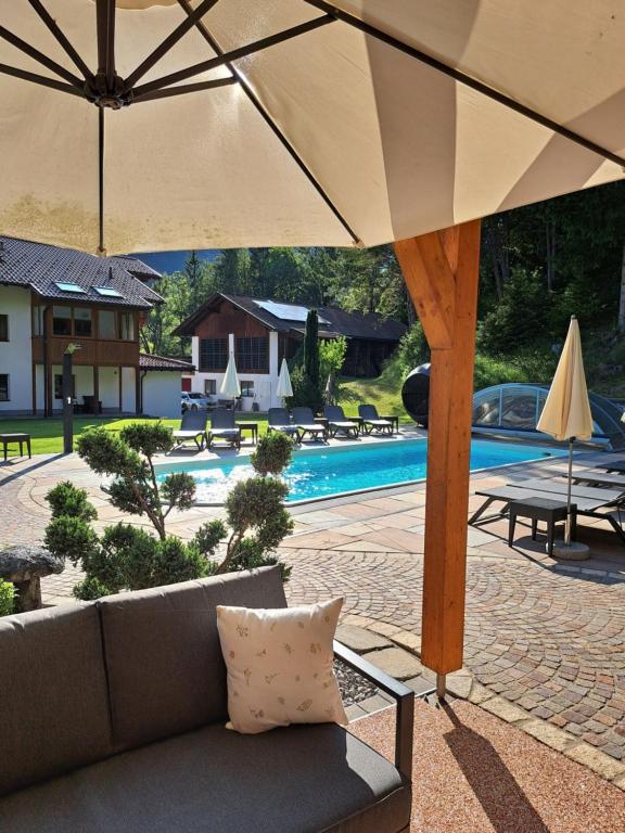 Bazén v ubytování Gästehaus Almrausch, Ferienanlage mit Pool nebo v jeho okolí