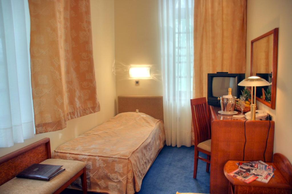Krevet ili kreveti u jedinici u okviru objekta Garni Hotel Park