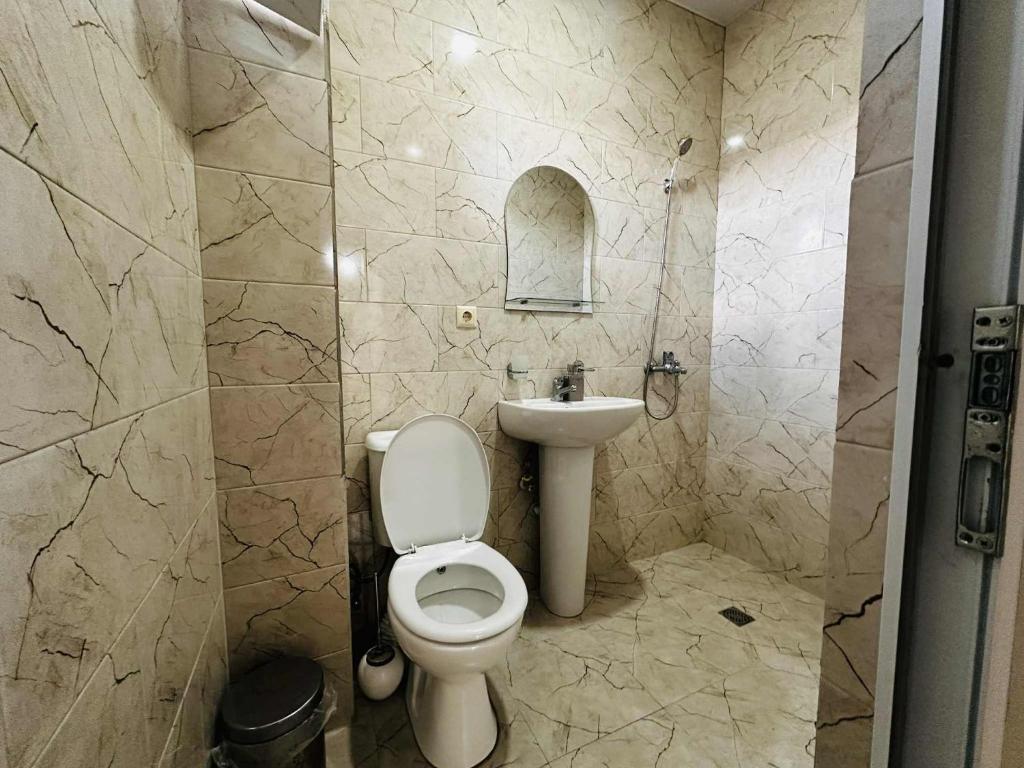 Koupelna v ubytování KISI Hotel