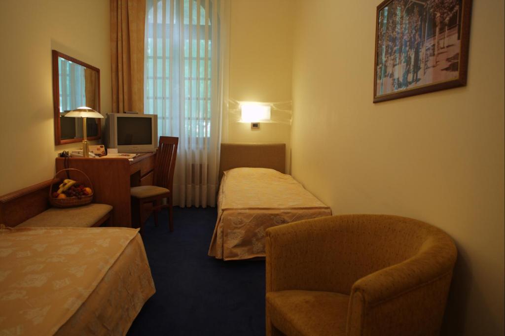 TV i/ili multimedijalni sistem u objektu Garni Hotel Park