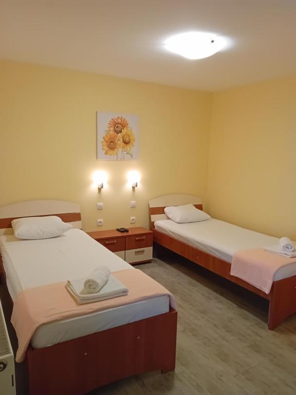 Katil atau katil-katil dalam bilik di Medijana Apartments Niš