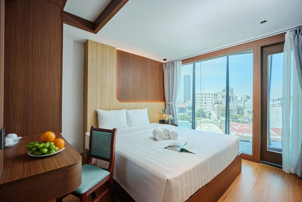 Postel nebo postele na pokoji v ubytování Elite Luxury Hotel