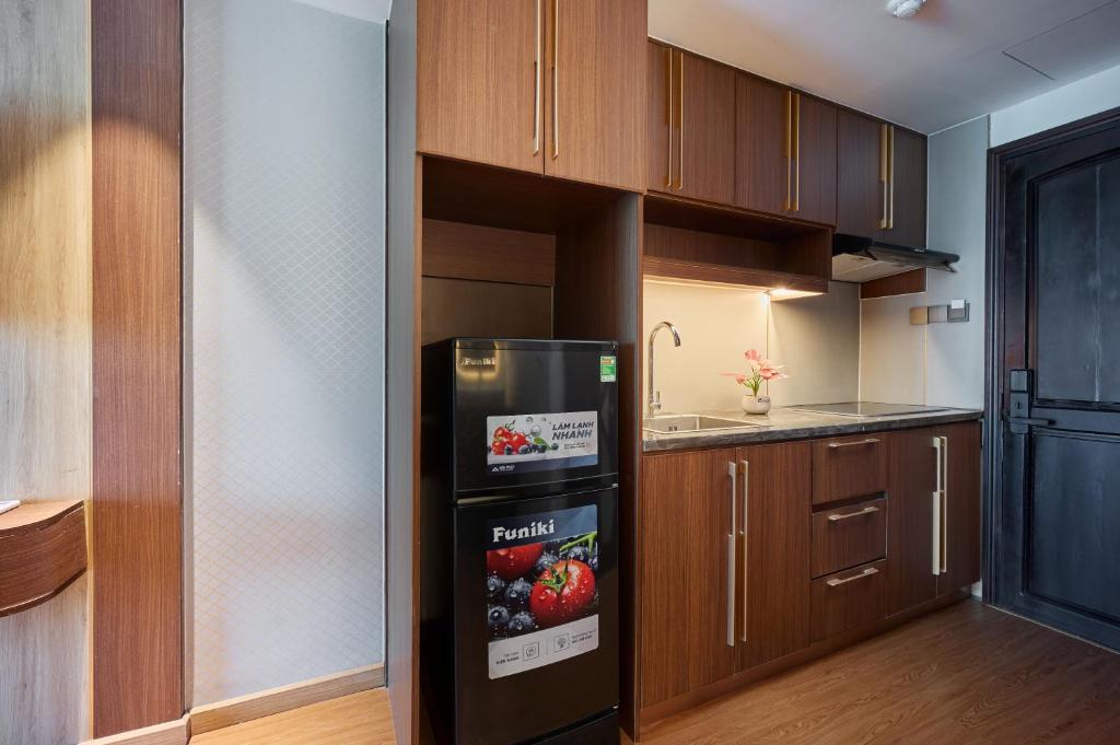 Kuchyň nebo kuchyňský kout v ubytování Elite Luxury Hotel