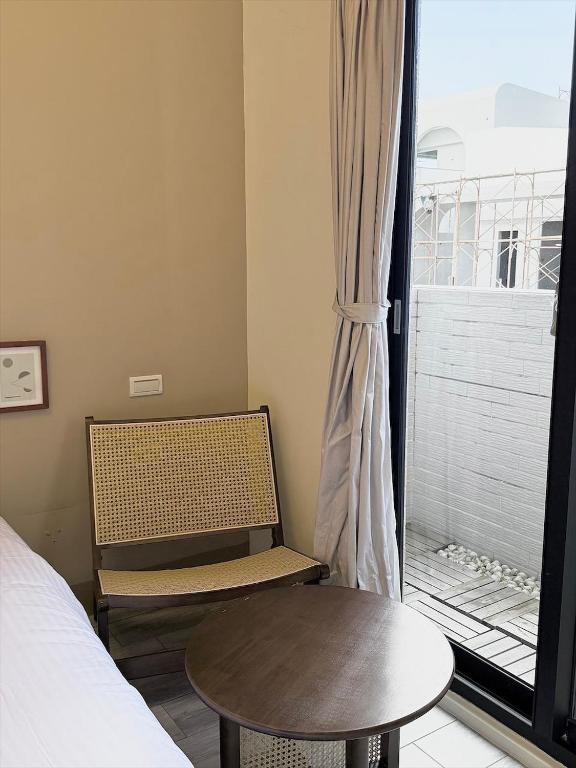 Postel nebo postele na pokoji v ubytování Kaile Roaming Homestay