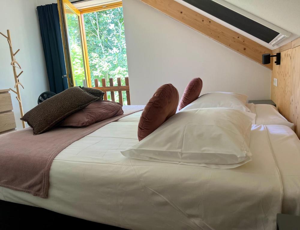 Postel nebo postele na pokoji v ubytování Hoeve Consensus Texel