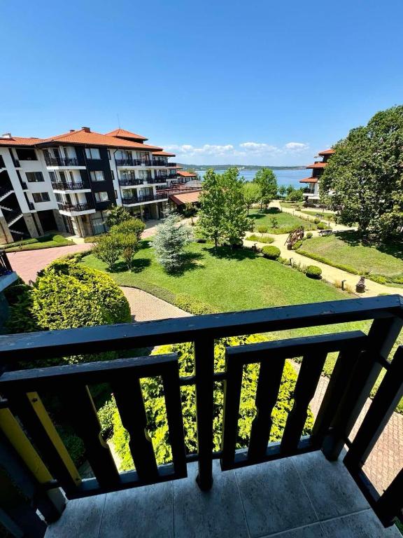 a balcony with a view of a park at Complex Gallery Saint Thomas in Sozopol