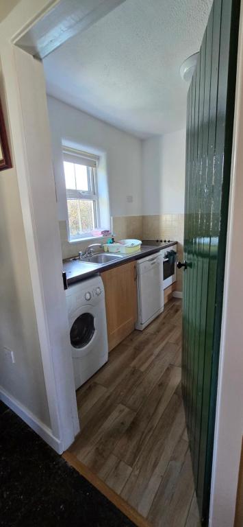 Kuchyň nebo kuchyňský kout v ubytování Daffodil Cottage 2 Bedroom