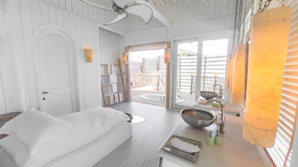 Postel nebo postele na pokoji v ubytování Aluoly 23 Private Resort