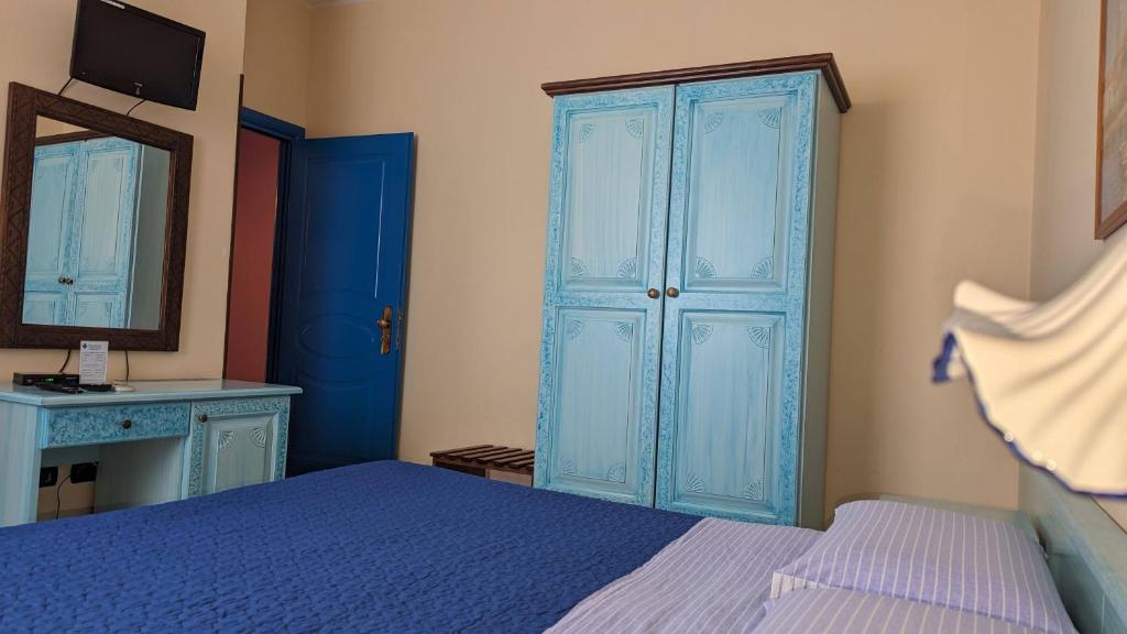 Postel nebo postele na pokoji v ubytování Hotel Aquarius