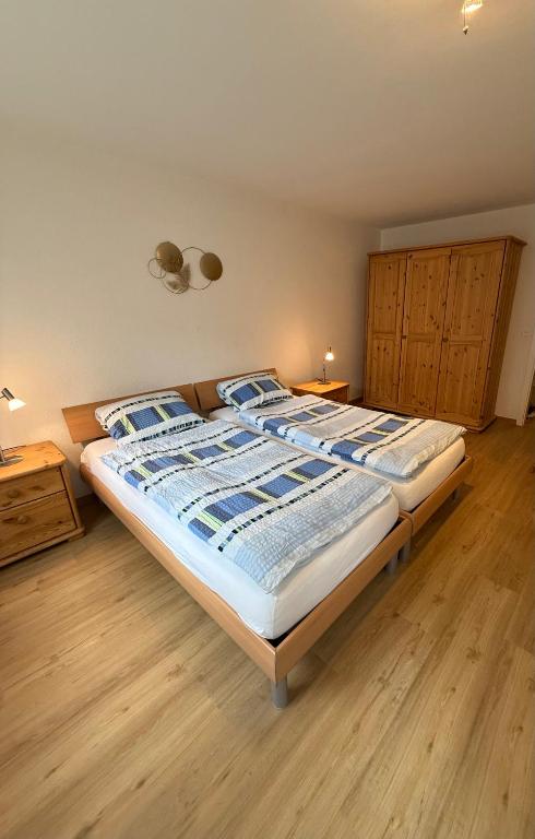 Postel nebo postele na pokoji v ubytování Saas-Fee Swiss Vacances