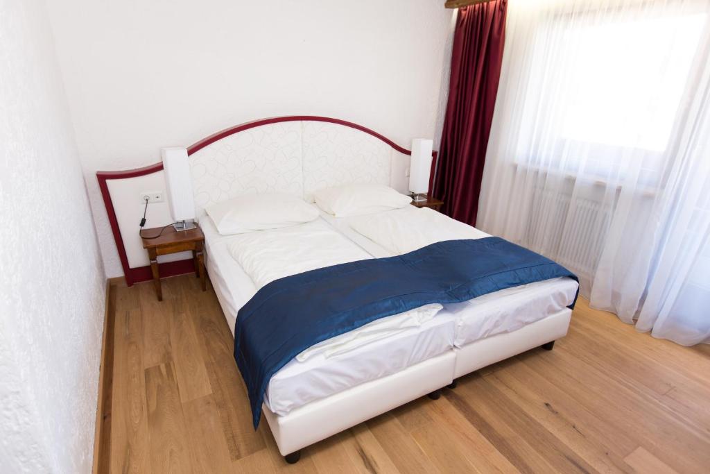 Postel nebo postele na pokoji v ubytování Hotel Hocheder