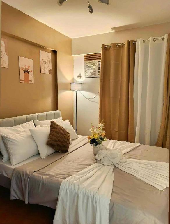 Katil atau katil-katil dalam bilik di Condominium in Davao city