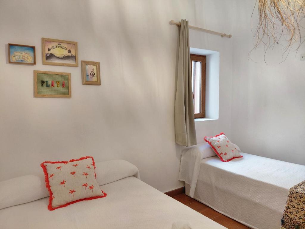 Ένα ή περισσότερα κρεβάτια σε δωμάτιο στο Casa Yesca Tarifa