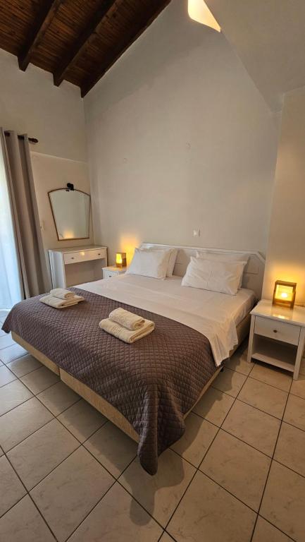 Ένα ή περισσότερα κρεβάτια σε δωμάτιο στο Bungalow White Apartments