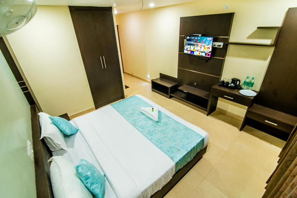 TV a/nebo společenská místnost v ubytování Hotel Shams Inn