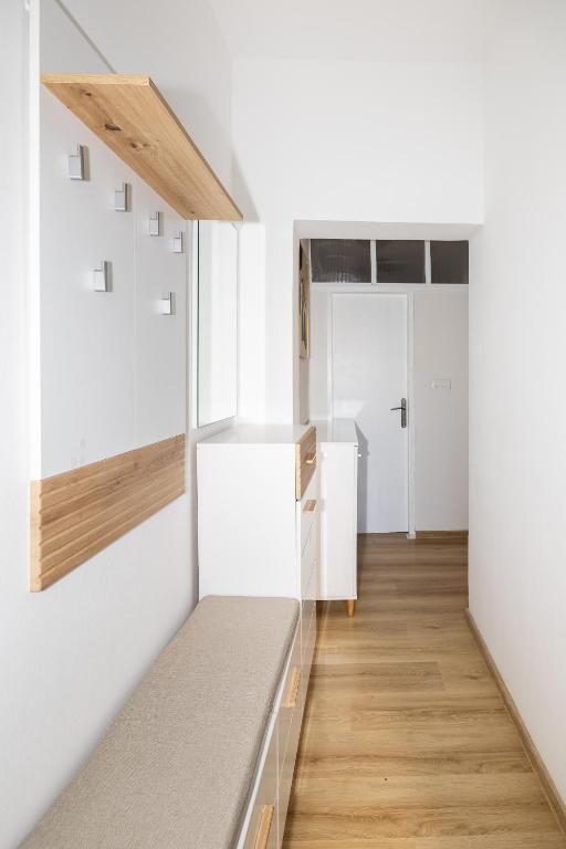 Posteľ alebo postele v izbe v ubytovaní tiho's apartments