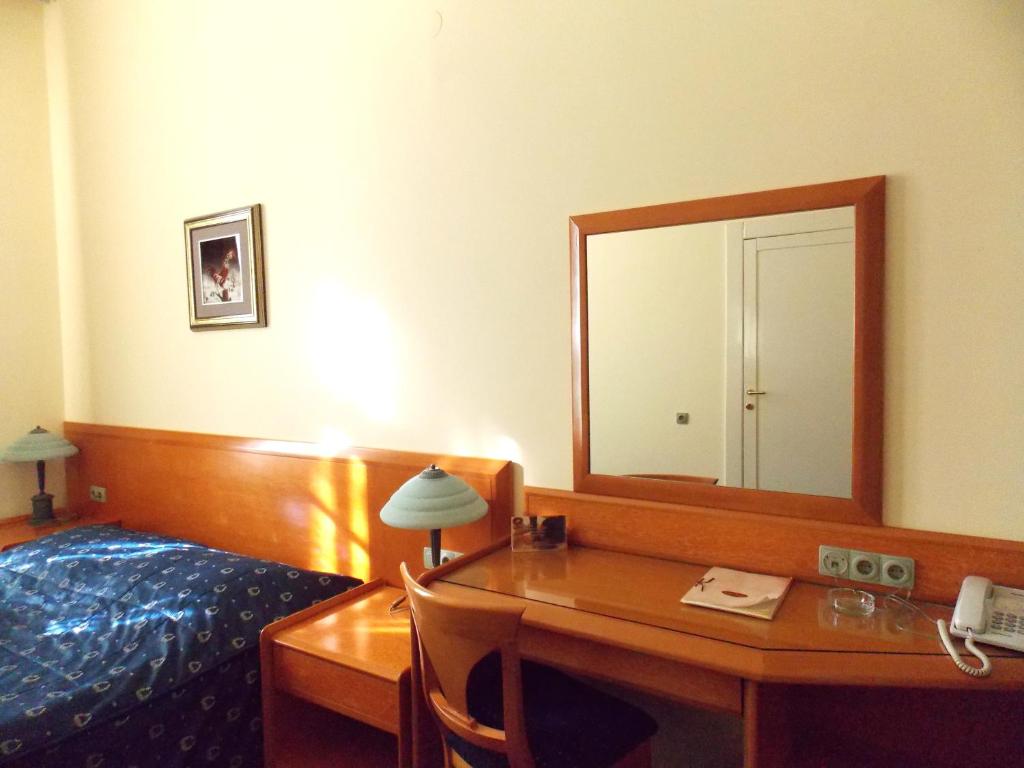 Krevet ili kreveti u jedinici u okviru objekta Garni Hotel Park