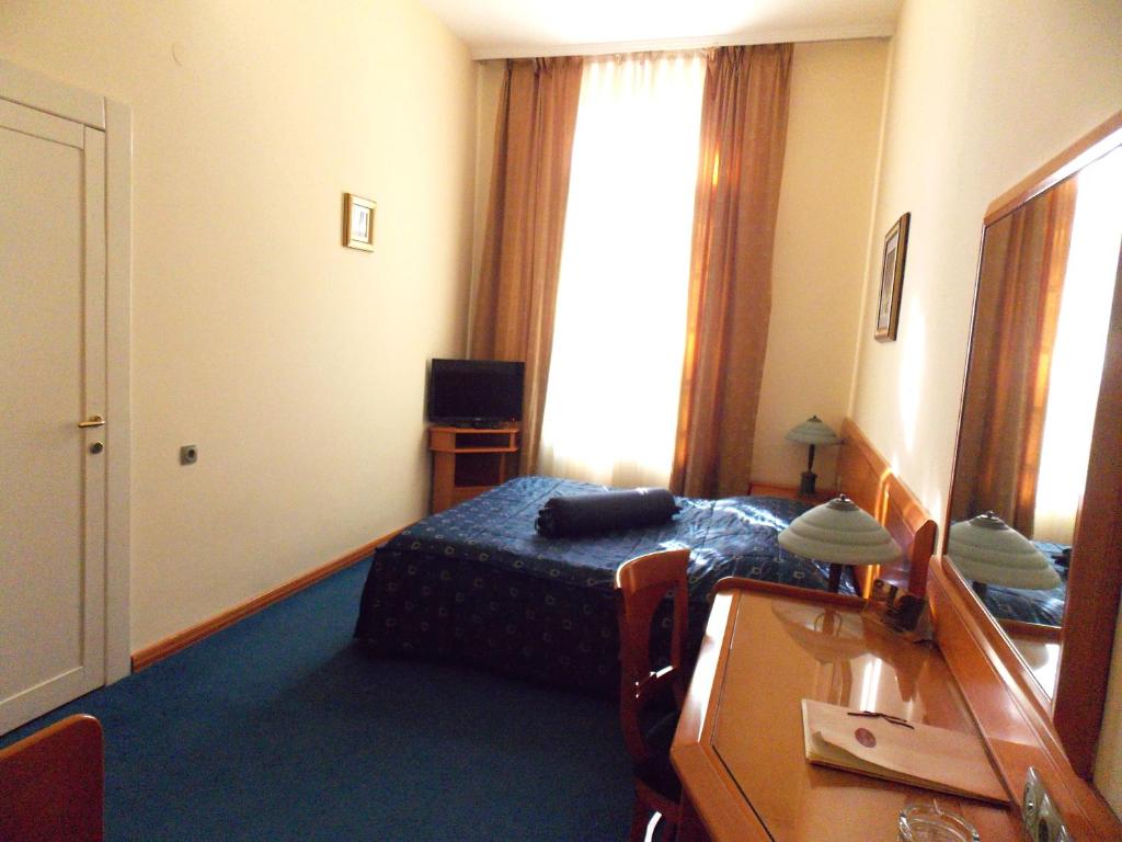 Krevet ili kreveti u jedinici u okviru objekta Garni Hotel Park