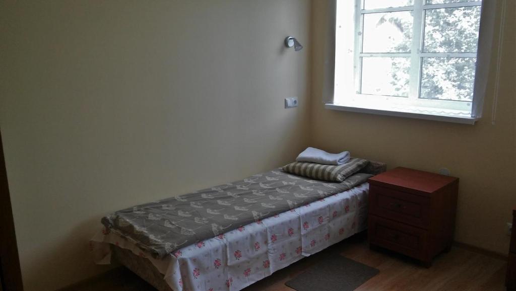 Postel nebo postele na pokoji v ubytování Kagu Hostel