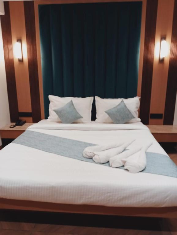 Postel nebo postele na pokoji v ubytování HOTEL SUPREME (VASCO)