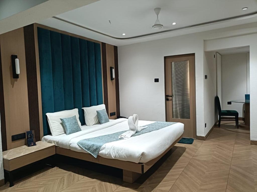 Postel nebo postele na pokoji v ubytování HOTEL SUPREME (VASCO)